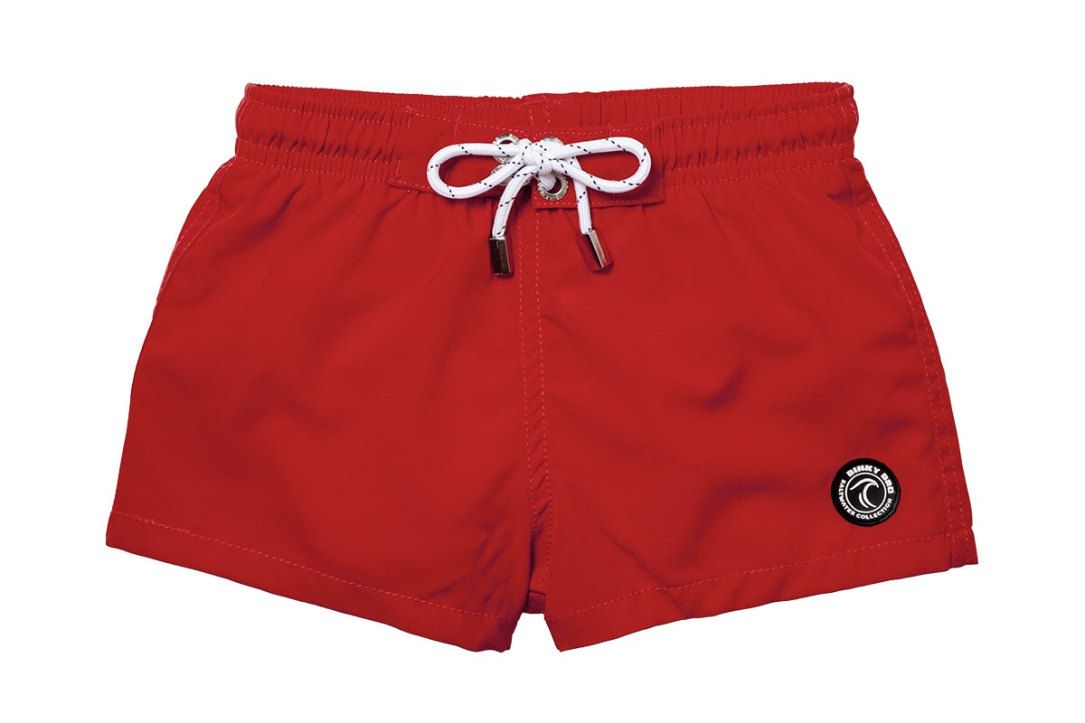 Bright red swim shorts with an adjustable drawstring and a logo patch, perfect for stylish beach days.