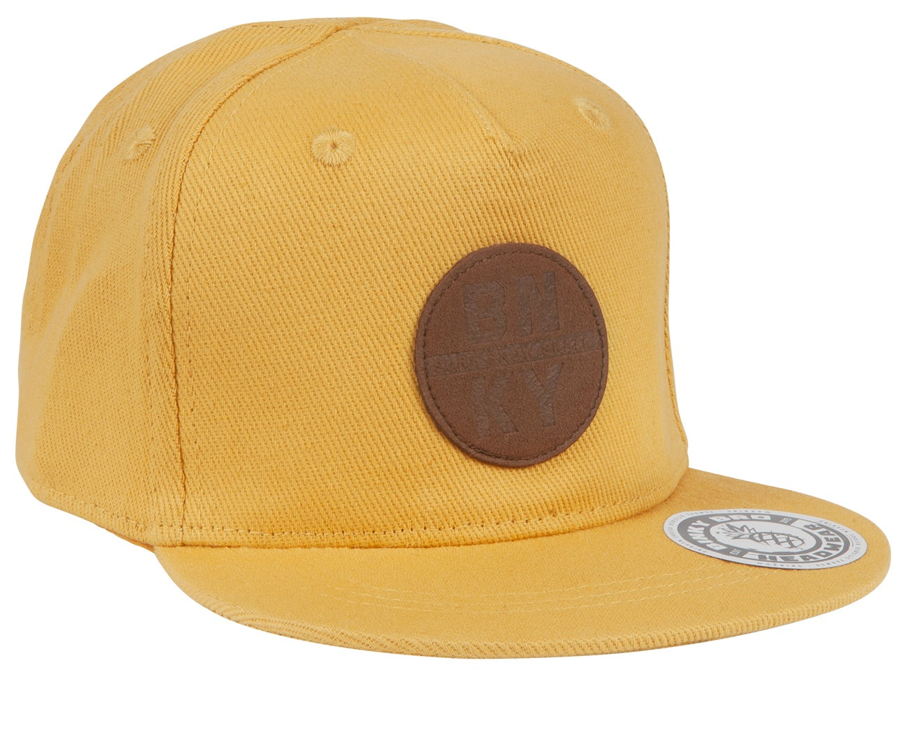 Stylish yellow snapback cap featuring a brown leather patch logo, perfect for kids' surf-snow-skate lifestyle.
