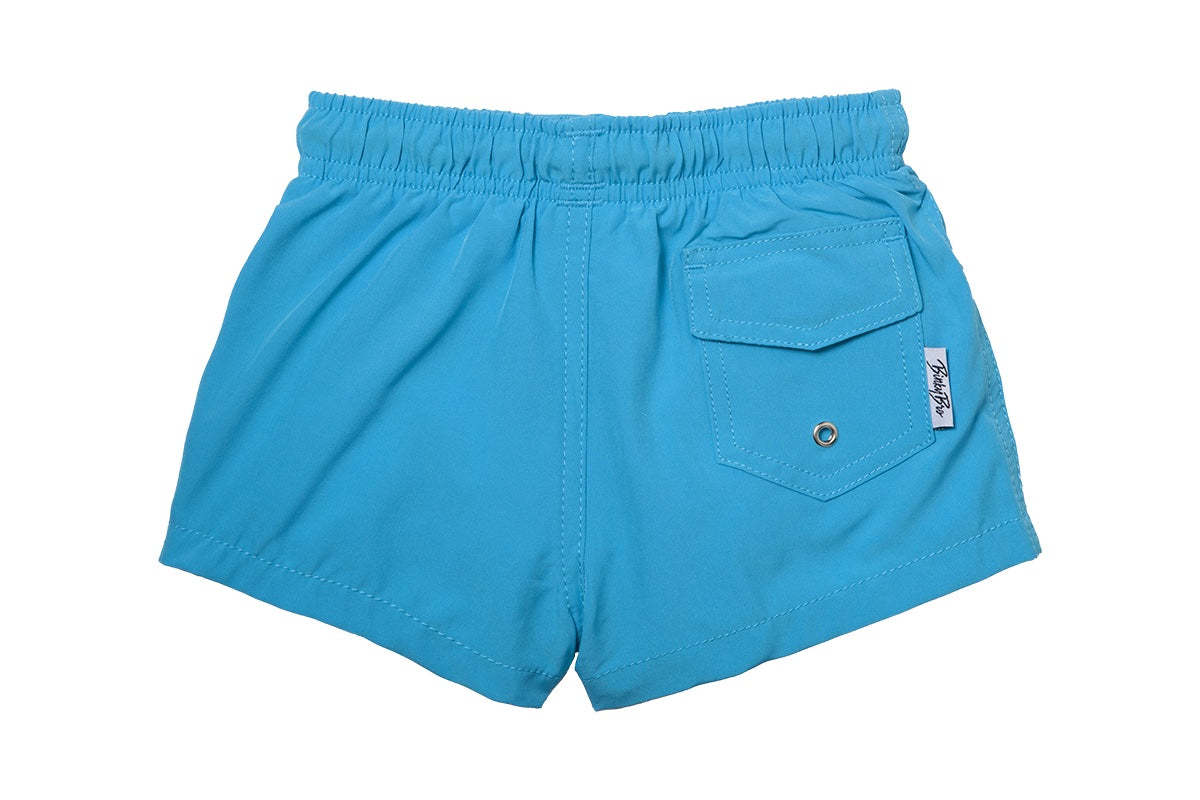 Bright blue swim shorts for kids featuring an elastic waistband and a back pocket, perfect for beach or pool days.