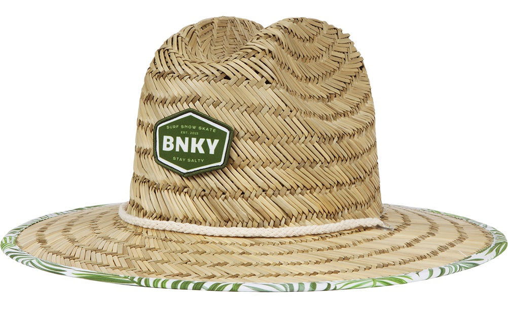 Stylish straw sun hat with a wide brim, featuring a green BNKY patch and tropical print under the brim, perfect for kids.