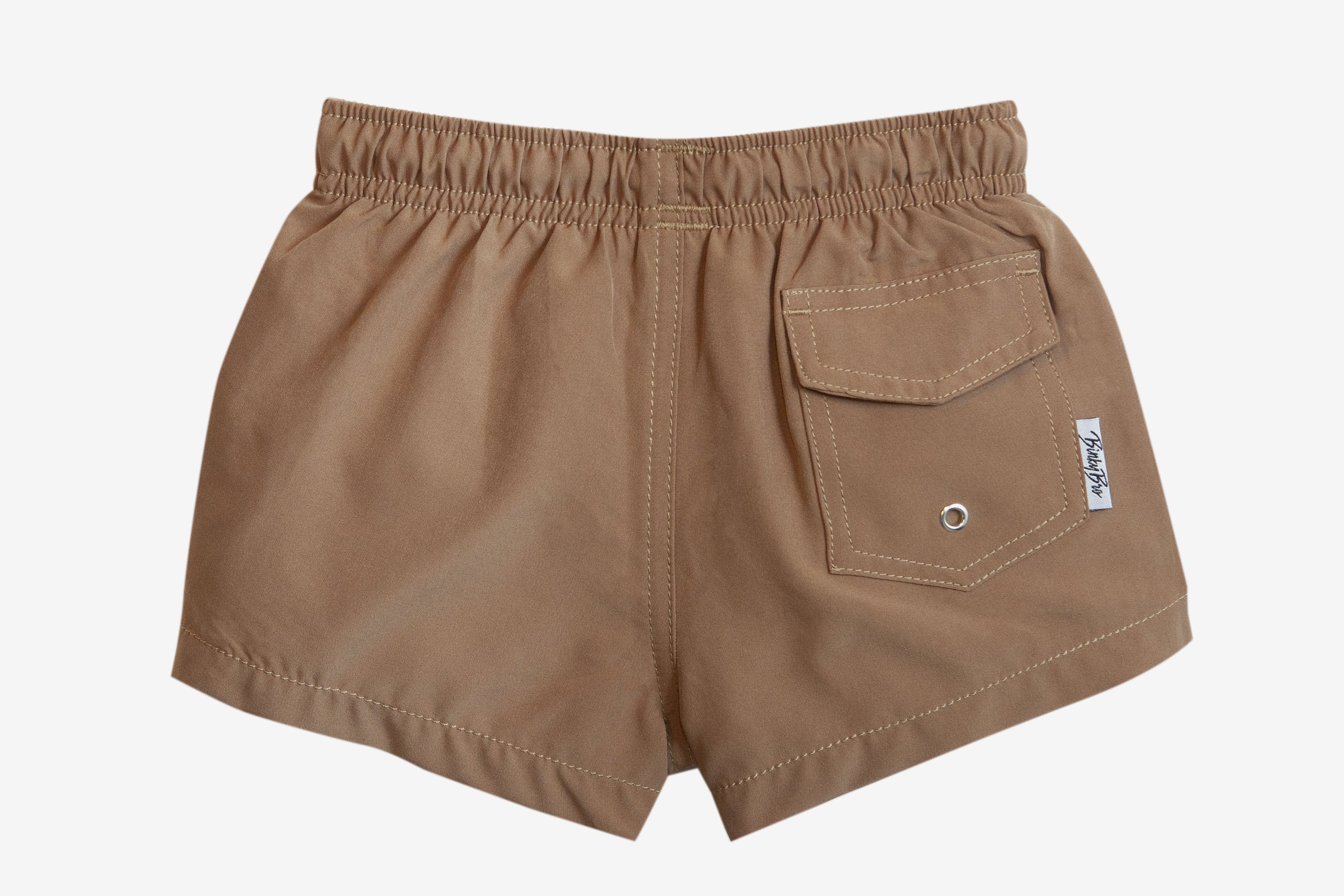 Brown swim shorts for kids featuring an elastic waistband and a back pocket, designed for stylish summer fun.