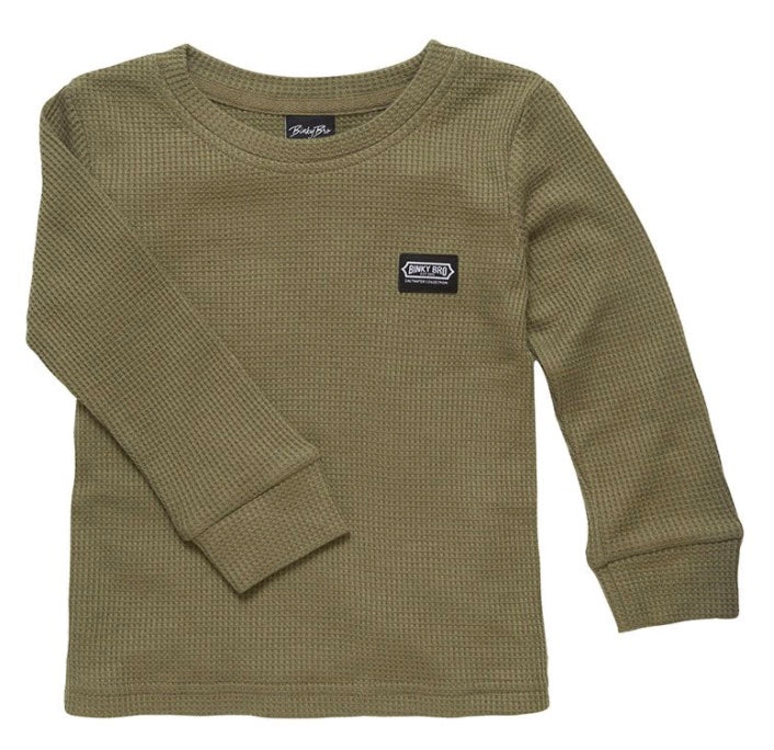 Olive green long-sleeve thermal shirt for kids featuring a small brand logo patch on the chest. Ideal for stylish layering.