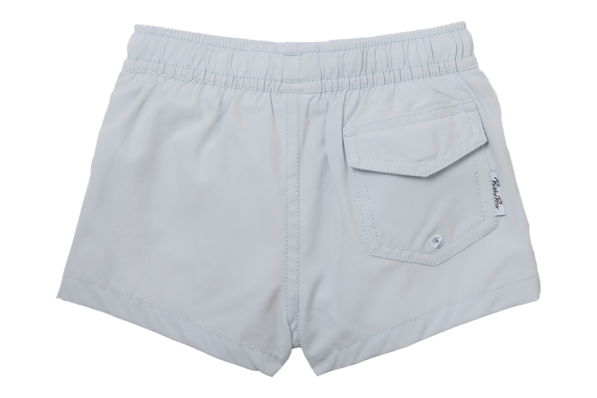 Light gray swim shorts for kids featuring an elastic waistband and a back pocket, perfect for beach or pool outings.