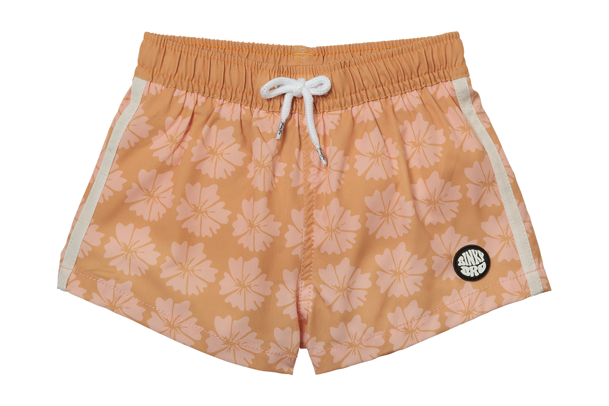 Stylish peach swim shorts with a floral pattern, featuring an elastic waistband and drawstring for a comfortable fit.