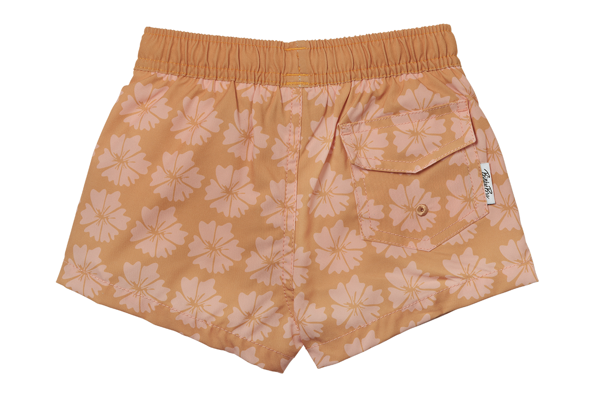 Tavaura Swimmie in peach with pink floral pattern, featuring an elastic waistband and back pocket. Ideal for kids' summer fun.