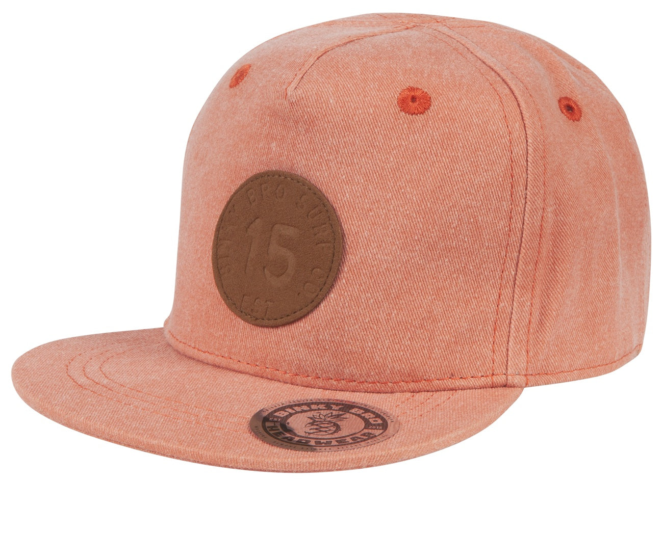 Stylish San Onofre snapback hat in a soft coral color with a textured fabric and embossed logo patch. Perfect for kids.
