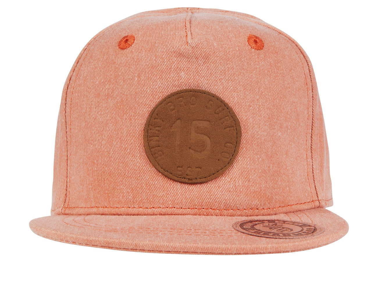 Stylish San Onofre snapback hat in a soft peach color with a round leather patch featuring the number 15.