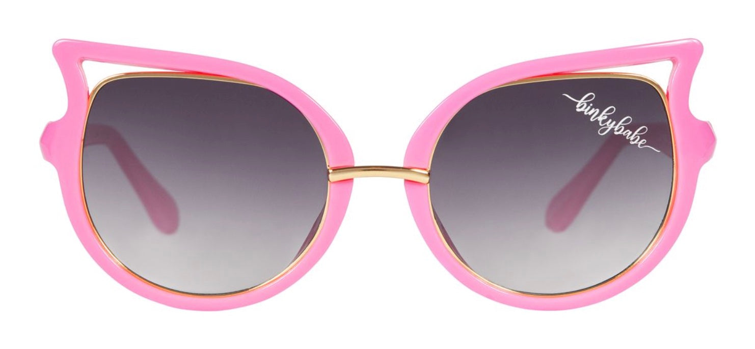 Stylish pink cat-eye sunglasses with gradient lenses, perfect for kids who love a trendy look. Ideal for sunny days.