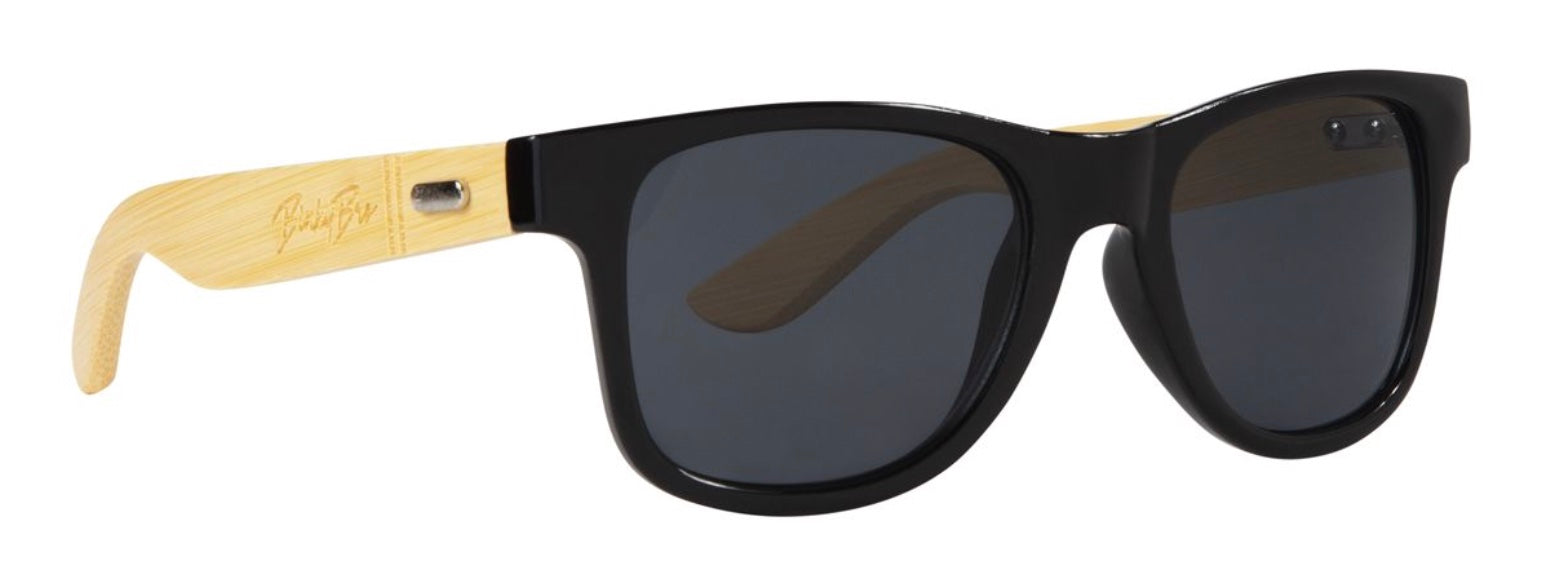 Stylish black sunglasses with bamboo arms, perfect for kids who love a surf-snow-skate lifestyle.