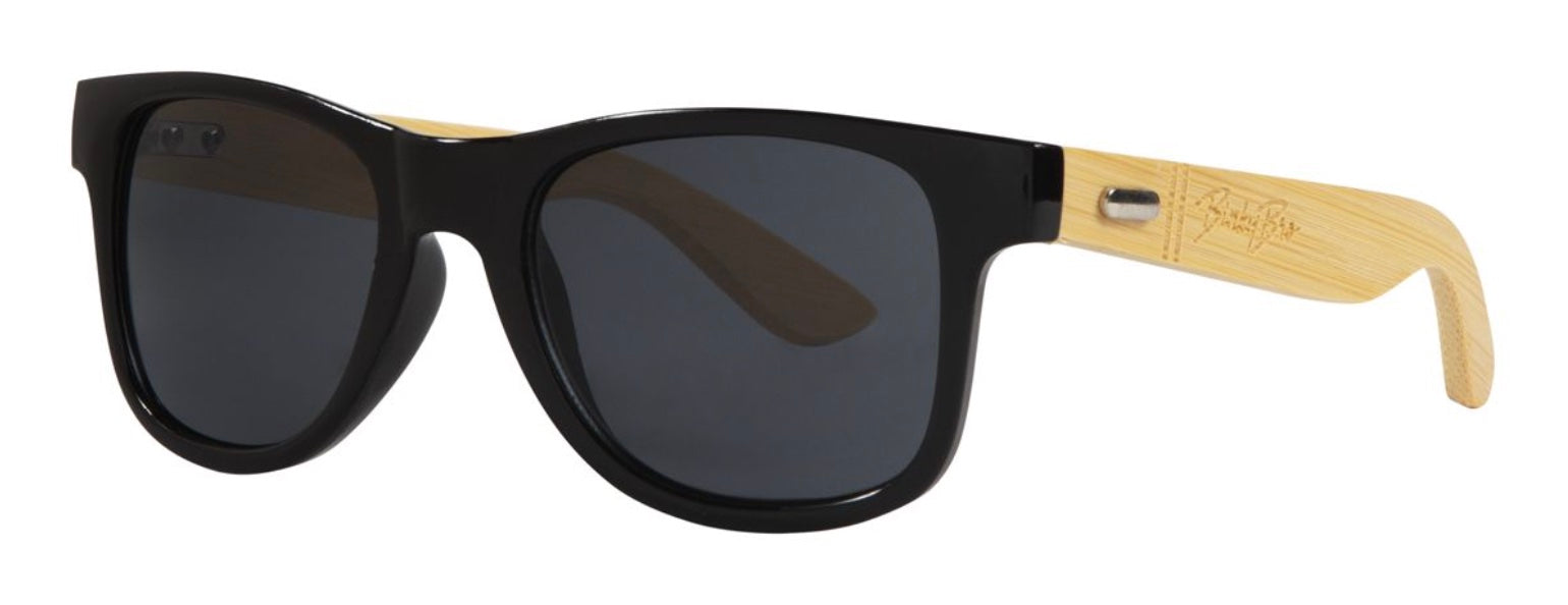 Stylish black sunglasses with bamboo arms, perfect for kids who embrace a surf-snow-skate lifestyle.