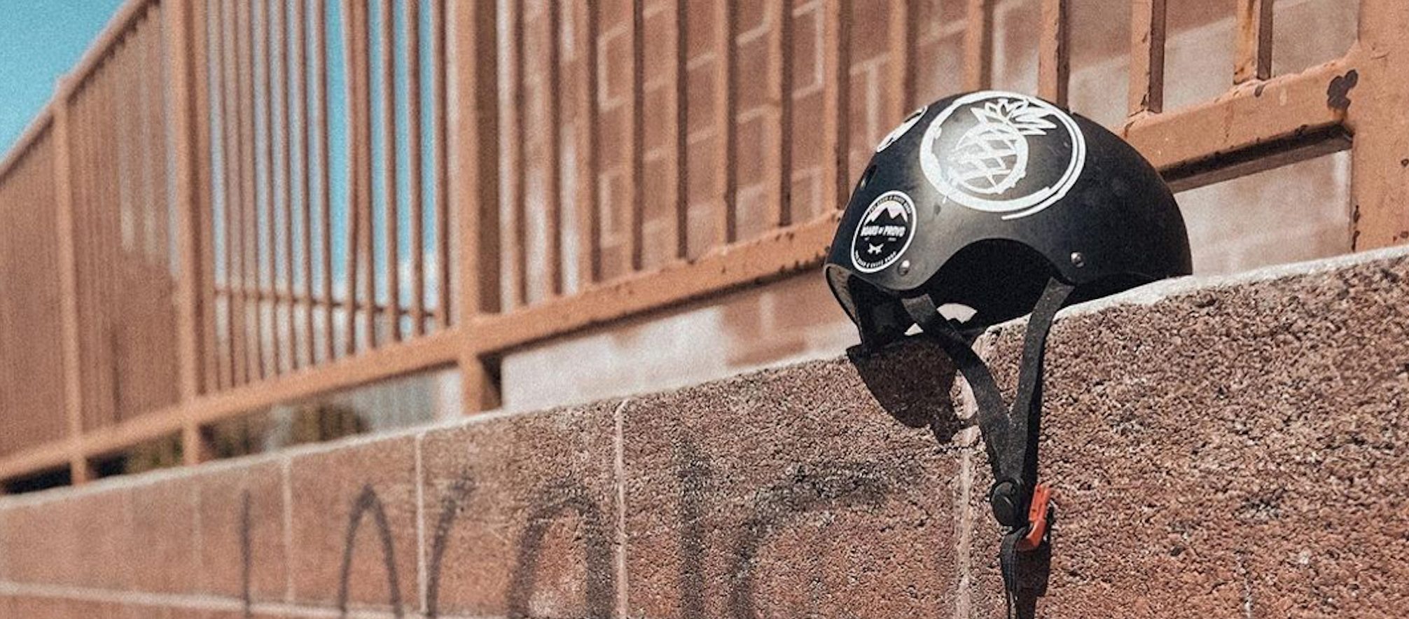 helmet on ledge with binkybro stickers