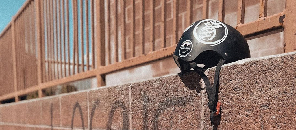 helmet on ledge with binkybro stickers