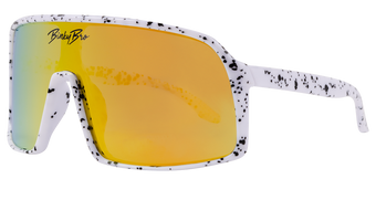 Stylish Monteverde sunglasses in white with black speckles and yellow-tinted lenses, perfect for kids' outdoor adventures.