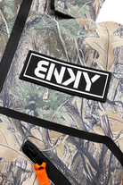 Stylish BNKY camo jacket featuring a bold logo patch and functional zip pockets, perfect for active youth.