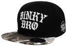 Stylish black snapback hat with bold white BinkyBro logo and a unique patterned brim, perfect for kids and youth.