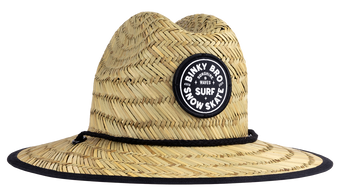 Stylish straw sun hat with a wide brim and a black logo patch, perfect for outdoor adventures in surf, snow, and skate.