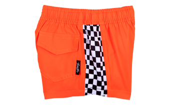 Bright orange shorts featuring a checkered side panel and a side pocket, perfect for active kids. Ideal for summer adventures.