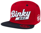 Red snapback hat with a white embroidered "Binky Bro" logo and a black flat brim, designed for kids' surf-snow-skate style.