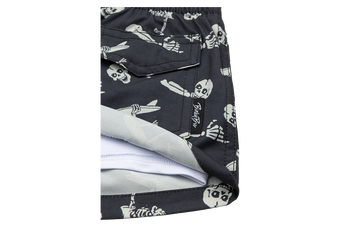 Stylish black swim trunks featuring a playful crossbones and skeleton design, perfect for kids' summer adventures.