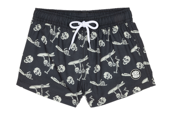 Stylish black swim trunks featuring a playful skeleton print, perfect for kids who love surf and skate culture.