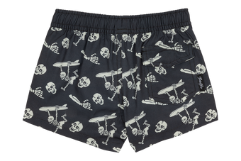 Stylish black swim trunks featuring a playful skeleton and surfboard print, perfect for kids' beach adventures.