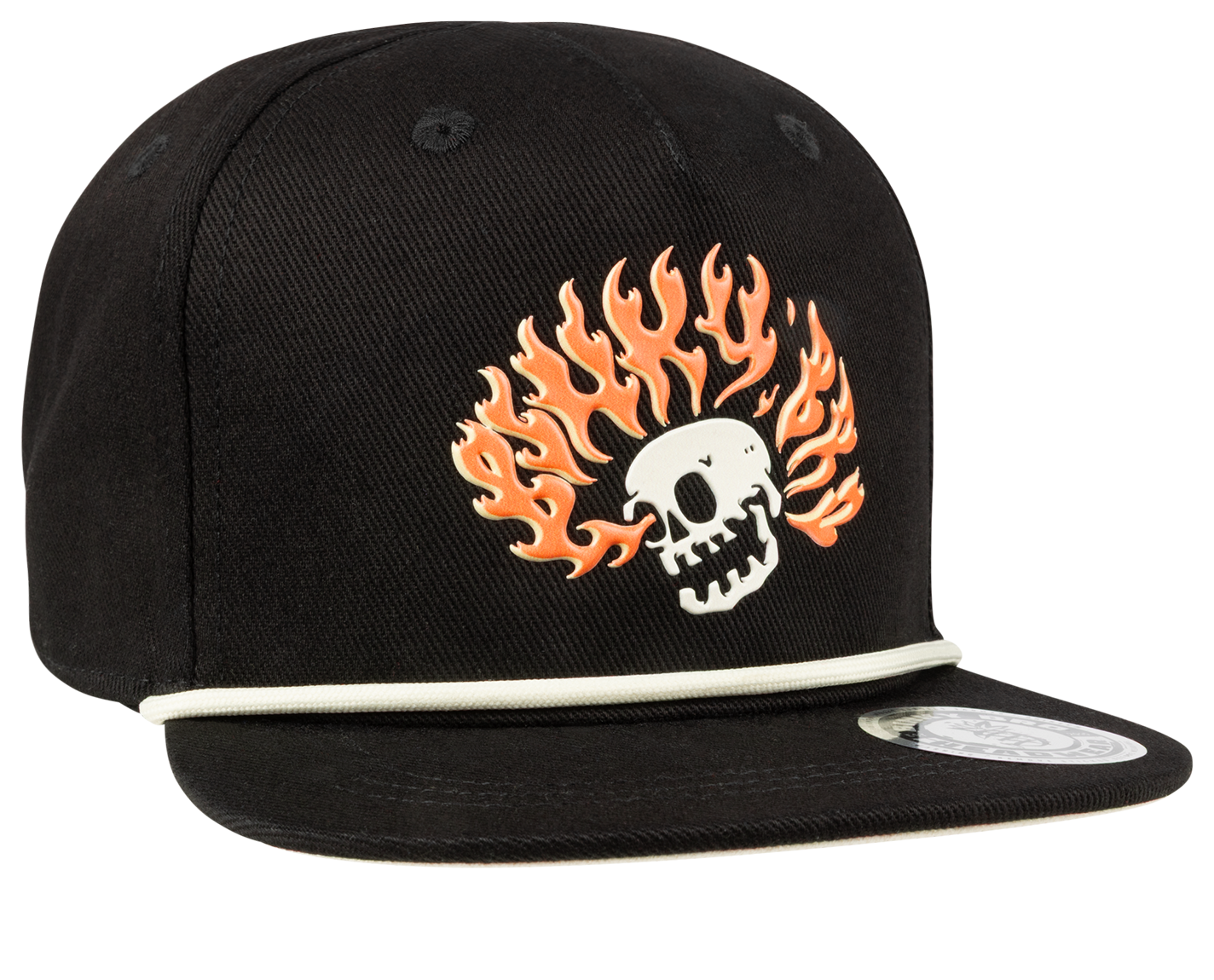 Black snapback hat featuring a skull with fiery orange flames, designed for a stylish surf-snow-skate look for youth.