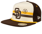 Stylish brown and cream snapback cap featuring San Diego logo, yellow accents, and braided rope detail. Perfect for kids.