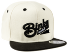 Stylish two-tone snapback cap featuring BinkyBro logo, perfect for kids embracing surf-snow-skate culture.