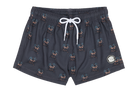 Stylish swim shorts featuring a palm tree print, perfect for kids who love a surf-snow-skate lifestyle.