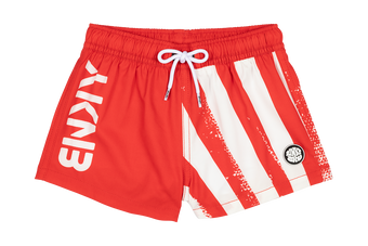 Red swim shorts featuring white stripes and the BinkyBro logo, designed for active kids with a stylish surf-snow-skate vibe.