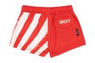 Red swim shorts with white diagonal stripes and a back pocket featuring the brand logo, designed for kids.