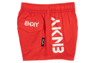 Bright red swim shorts featuring a side pocket and bold white branding, perfect for active kids enjoying summer fun.