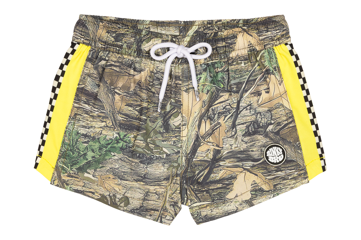 Camo swim shorts with yellow side panels and checkered accents, perfect for kids' summer adventures.
