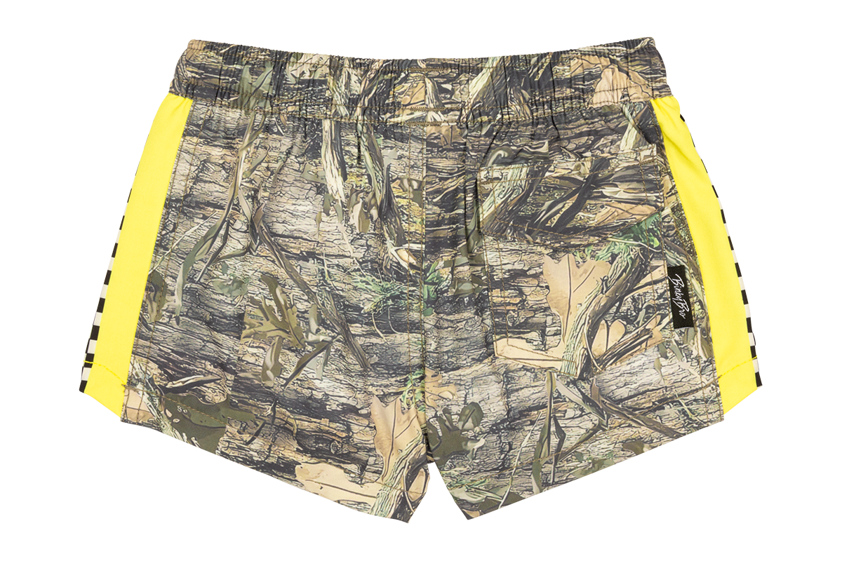 Camo shorts with yellow side panels, designed for active kids, perfect for outdoor adventures and playful days.