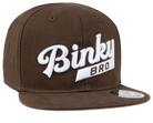 Brown snapback hat featuring a white embroidered "Binky Bro" logo, designed for stylish infants and toddlers.