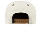 Back view of the Payson snapback hat featuring a cream fabric and adjustable brown strap, designed for kids.