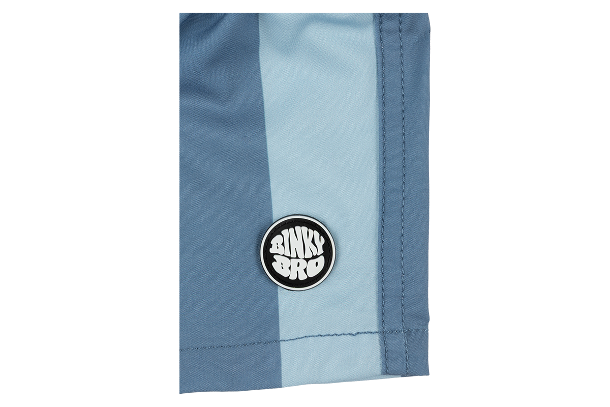 Stylish blue swim shorts featuring a BinkyBro logo, perfect for kids embracing a surf-snow-skate lifestyle.