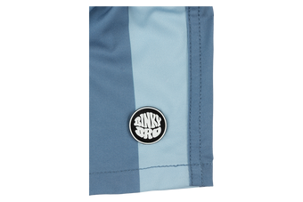 Stylish blue swim shorts featuring a BinkyBro logo, perfect for kids embracing a surf-snow-skate lifestyle.