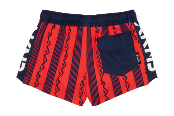 Stylish crimson swim shorts featuring a bold striped pattern and a navy pocket, perfect for active kids.