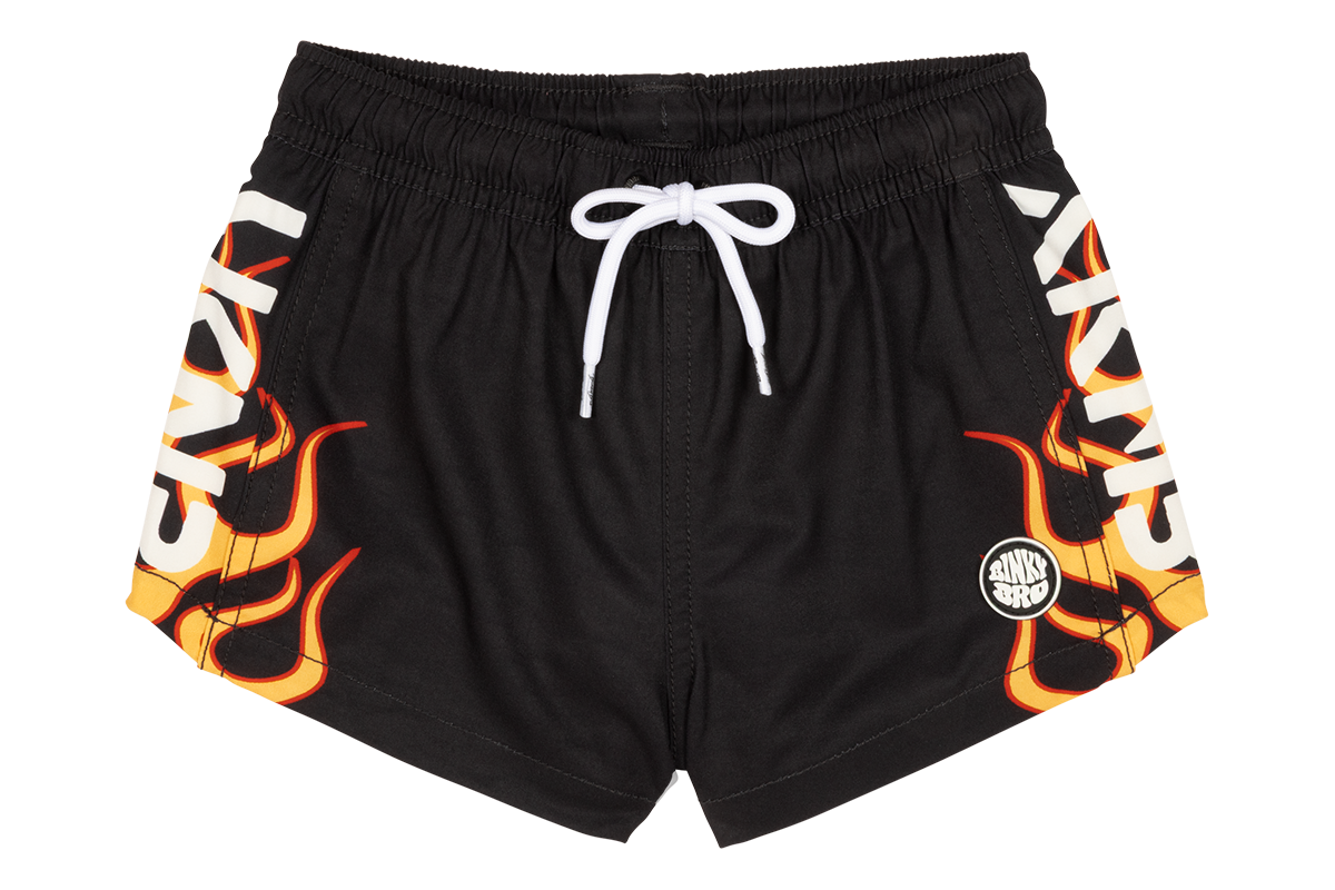 Black swim shorts featuring vibrant stamped flame graphics on the sides and a white drawstring for adjustable fit.