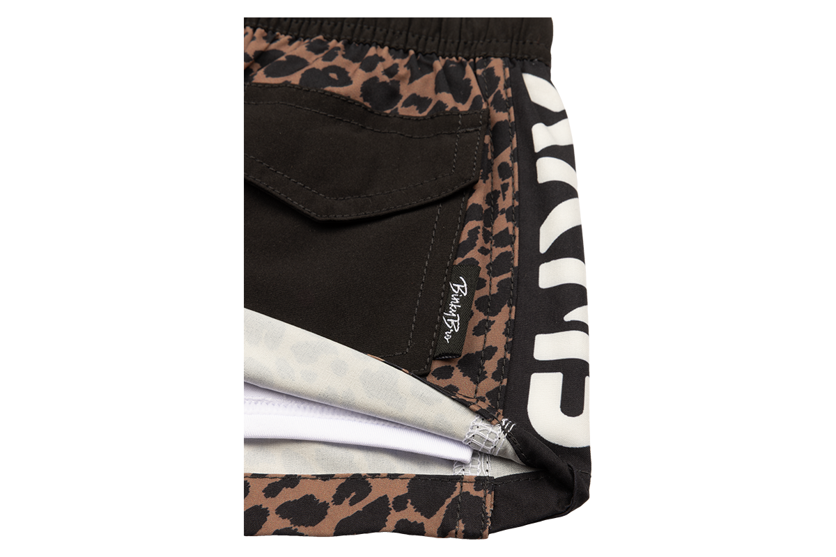 Stylish Stamped Leopard shorts featuring a trendy leopard print and bold branding, perfect for kids' activewear.