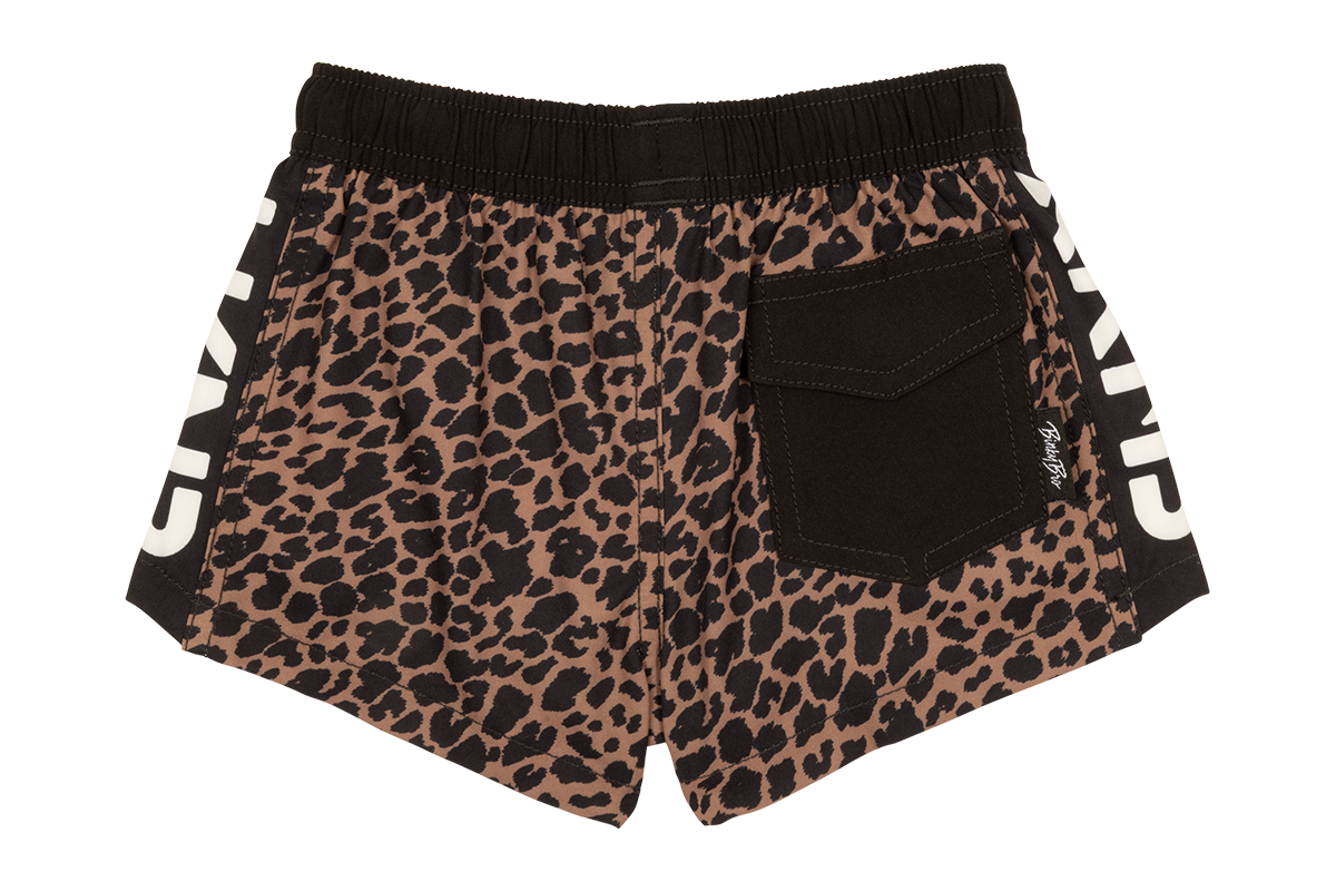 Stylish leopard print shorts with a black waistband and pocket, perfect for active kids who love adventure.