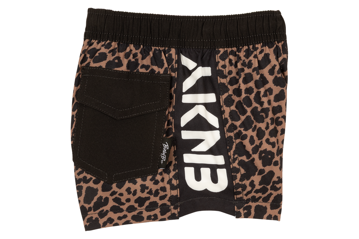 Stylish leopard print shorts featuring a black pocket and bold BinkyBro branding, perfect for active kids.