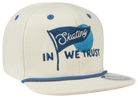 Stylish cream snapback hat featuring blue "Skating In We Trust" embroidery and a contrasting blue trim.